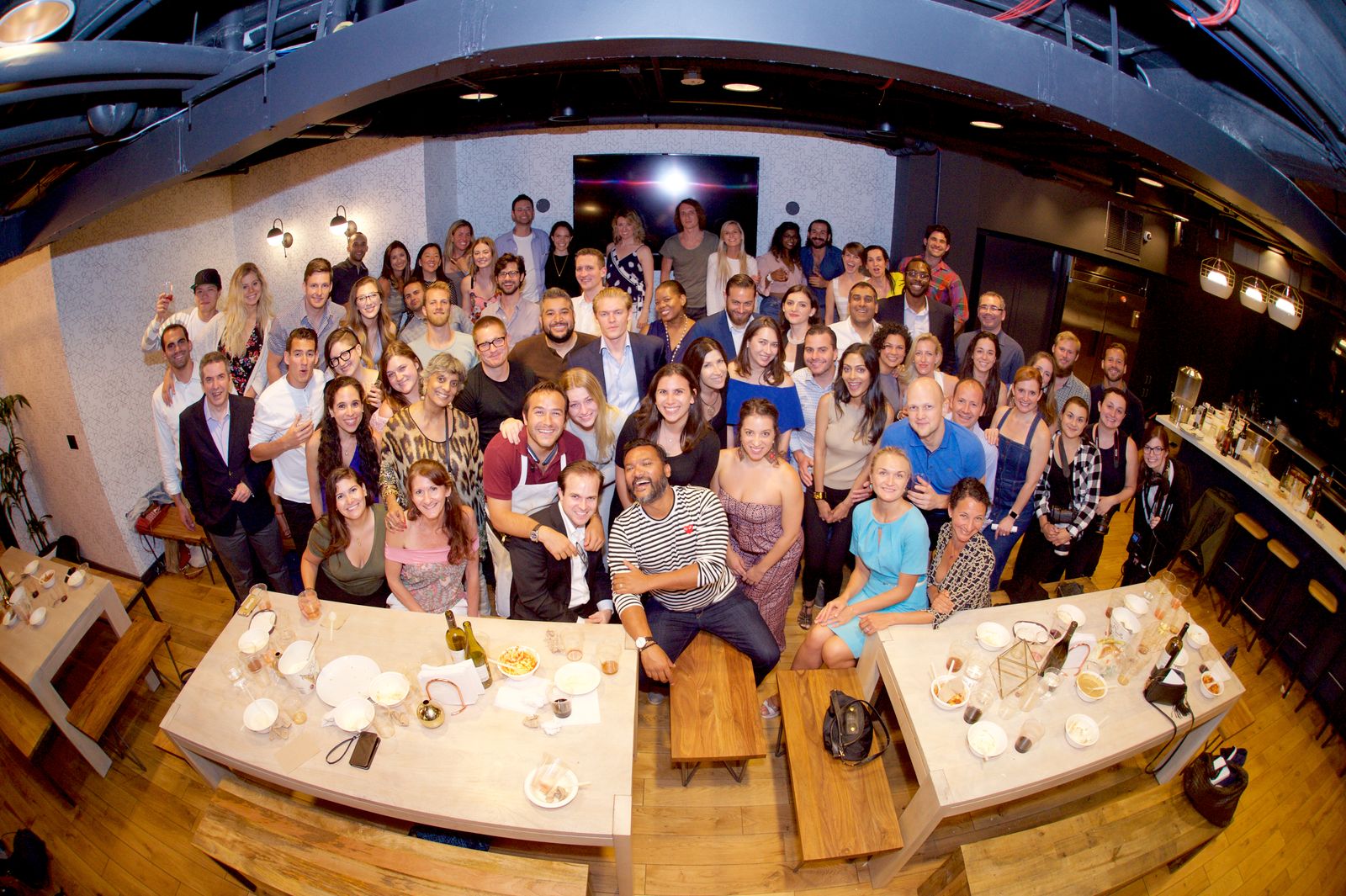 Guests gathered around a 7:47 dinner table