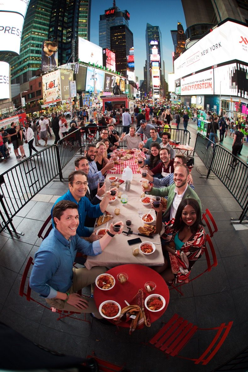 Guests gathered around a 7:47 dinner table
