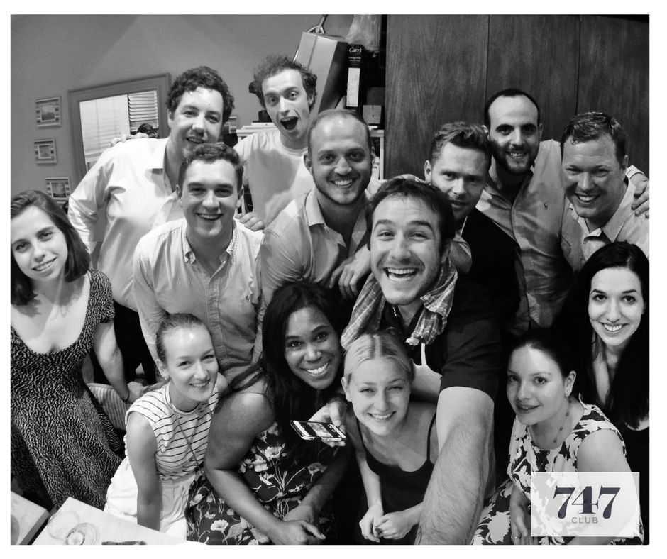 Guests gathered around a 7:47 dinner table