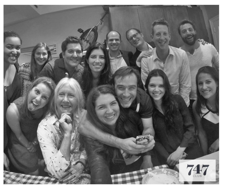 Guests gathered around a 7:47 dinner table